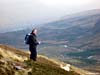 One man and his dog with Glen Lyon in the background