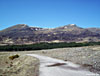 Munro tops An Cearcallach and Meall Coire Choille-rais from the track past Luiblea