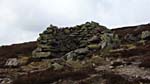 A stone shelter on the way down by An Diollaid